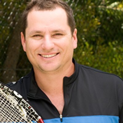 Tennis coach Joshua Eagle